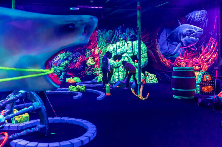 Aloha Amsterdam: 12-Hole Glow-in-the-Dark Mini-Golf - Entering Aloha Amsterdam near Amsterdam Centraal