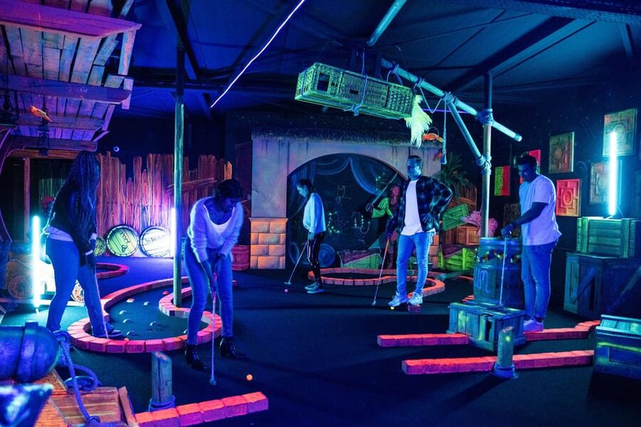Aloha Amsterdam: 12-Hole Glow-in-the-Dark Mini-Golf - Value at $10 per person