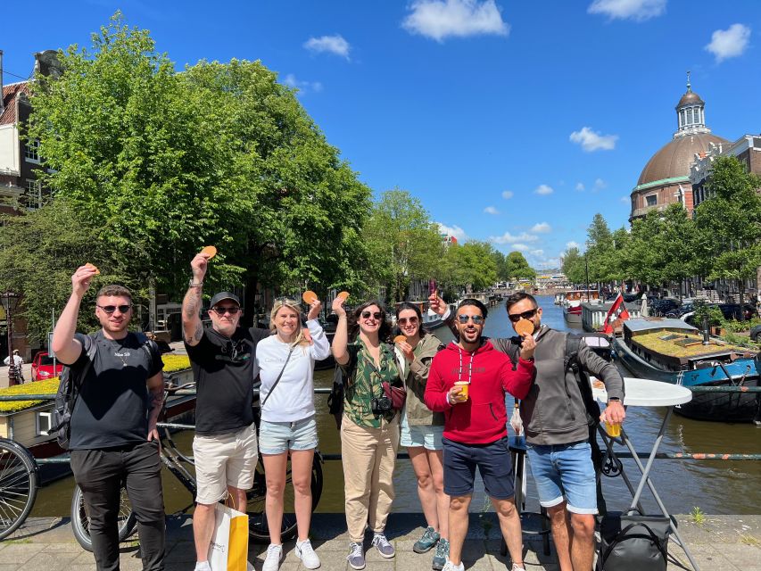 Amsterdam: 10 Tastings Guided Food Tour by UNESCO Canals - Spui Square and the first local snacks