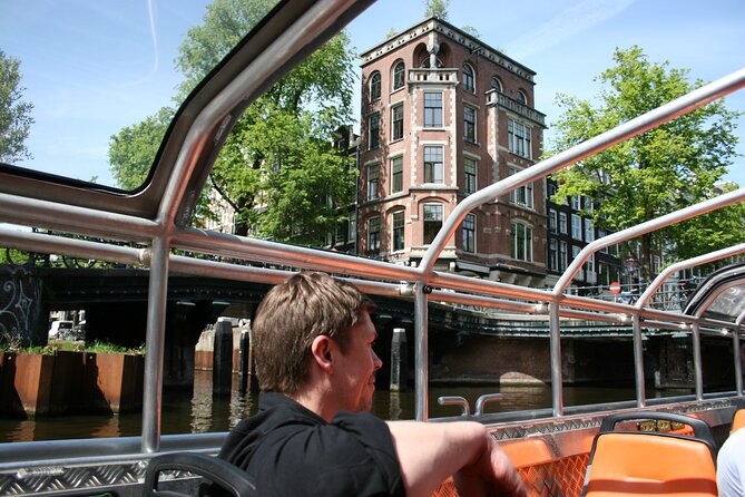 Amsterdam 1h Canal Cruise by Semi-Open Boat with Audio Guide - Starting near Centraal Station