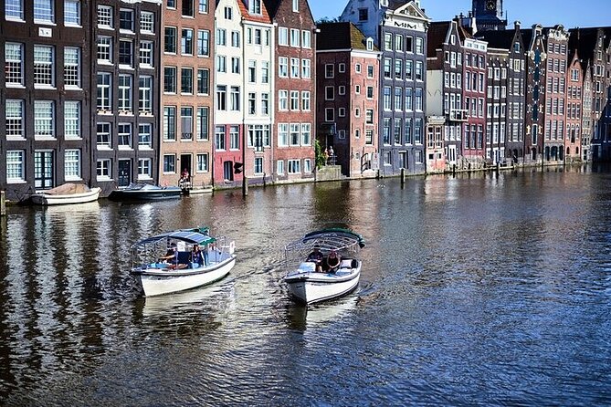 Amsterdam 2-hour Private Canal Cruise with Live Guide and Drinks - Reaching the Amstel and the Dancing Houses