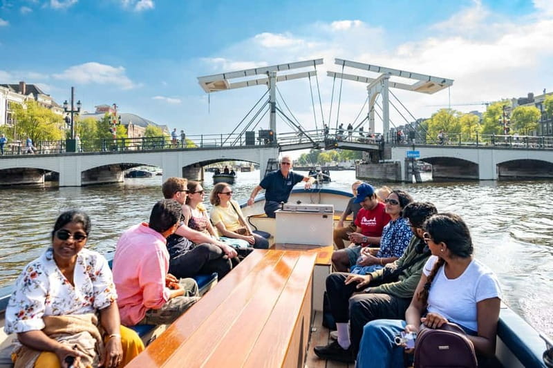 Amsterdam: 75 minute Open Boat Canal Cruise with Live Guide - Why this small boat works better than a standard cruise