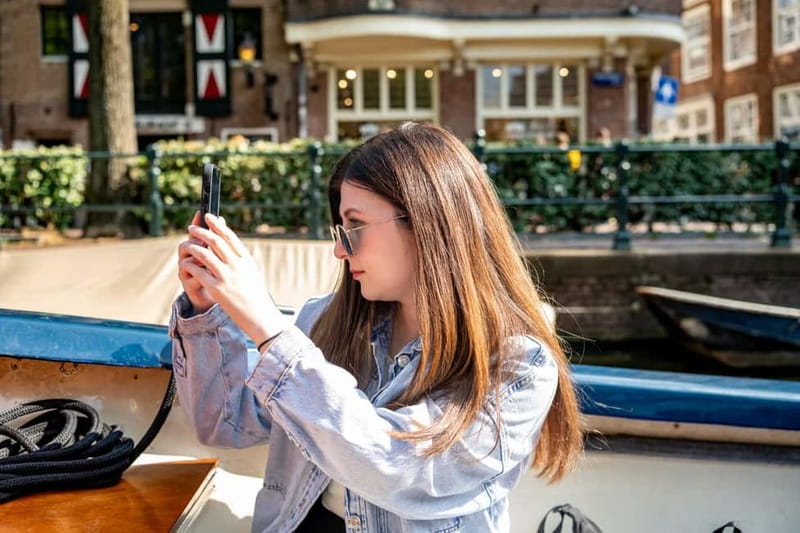 Amsterdam: 75 minute Open Boat Canal Cruise with Live Guide - Museum Quarter and the final return