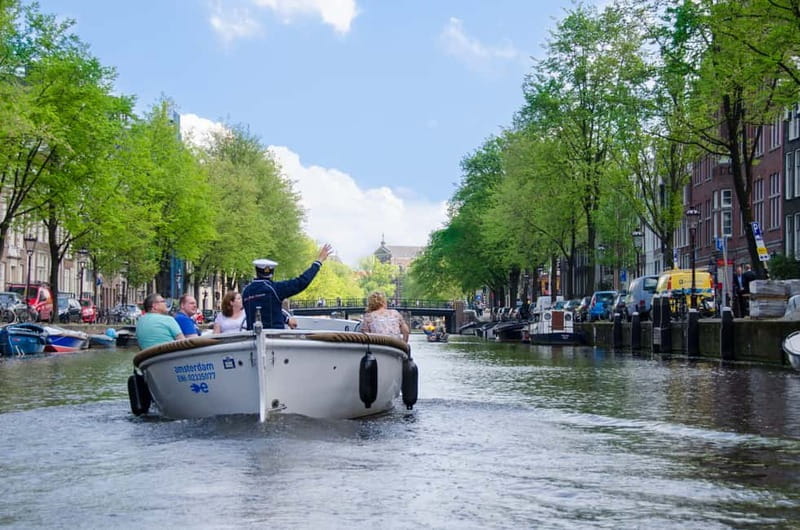 Amsterdam: 75 minute Open Boat Canal Cruise with Live Guide - From Leidseplein to the Golden Bend
