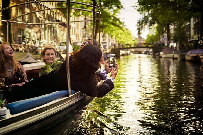Amsterdam 90-min Private Canal Cruise with Live Guide and Drinks - Key things to know before you book