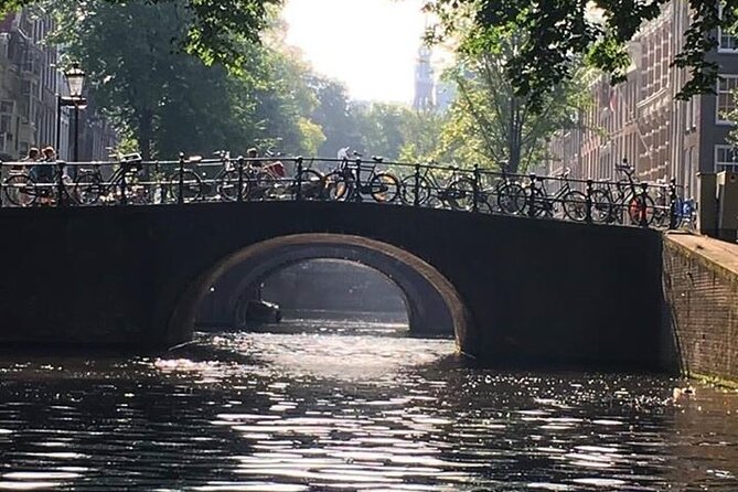 Amsterdam 90-min Private Canal Cruise with Live Guide and Drinks - Out onto the Amstel