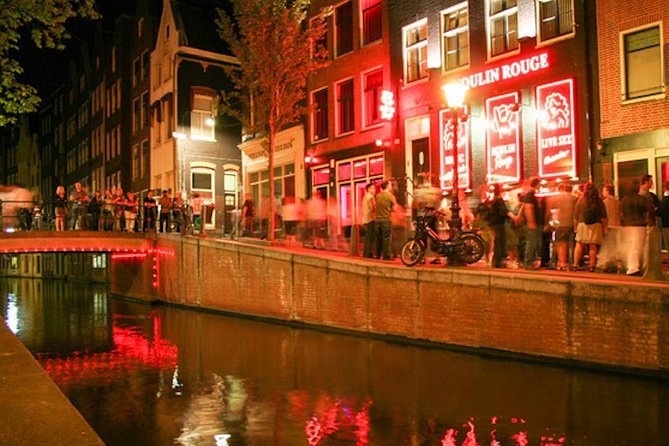 Amsterdam After Dark: Public Red Light District Exploration - The red windows and the women behind them