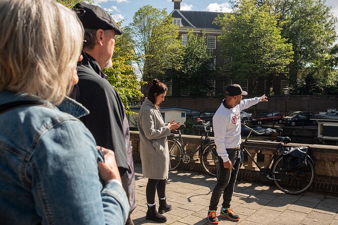 Amsterdam: Anne Frank and World War II Walking Tour (TOP RATED) - Walking toward Dam Square and the Royal Palace