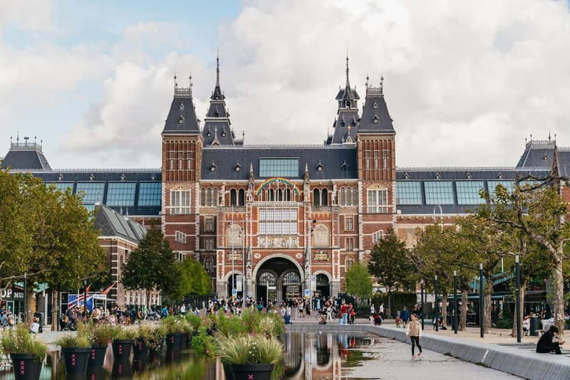 Amsterdam: Bike Tour with Optional Cruise in Small-Group - Artis Zoo and De Gooyer Windmill