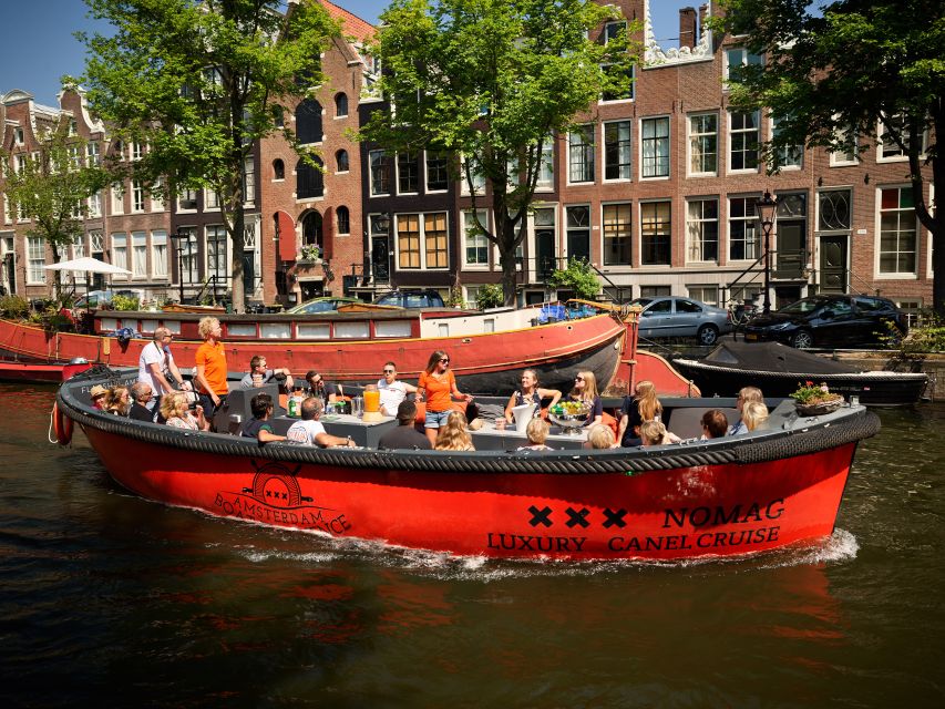Amsterdam: Canal Belt Private Beer Boat Tour - Open-top comfort and Amsterdam weather
