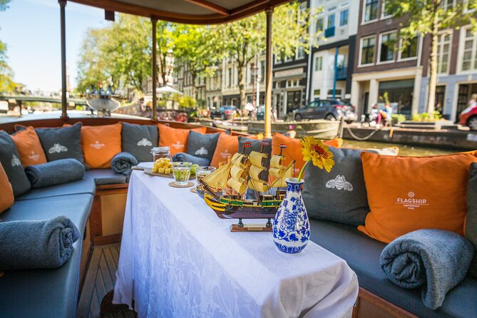 Amsterdam Canal Cruise in Classic Salon Boat With Drinks and Cheese - Boarding at Amsterdam’s canal-side meeting point
