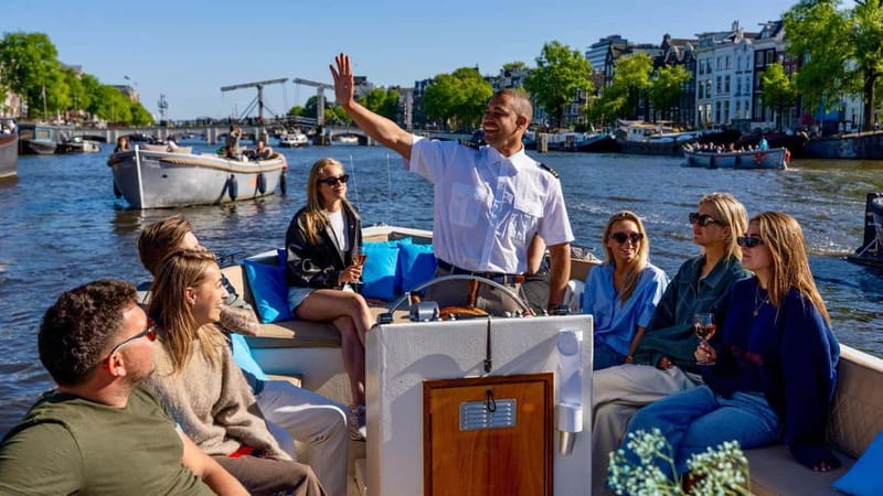 Amsterdam: Canal Cruise in Open Boat with Drink Option - Why Amsterdam’s canals are best seen from a low boat