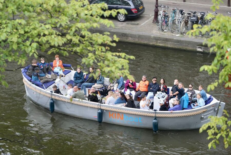 Amsterdam: Canal Cruise in Open Boat with Drink Option - What the open boat feels like in real weather