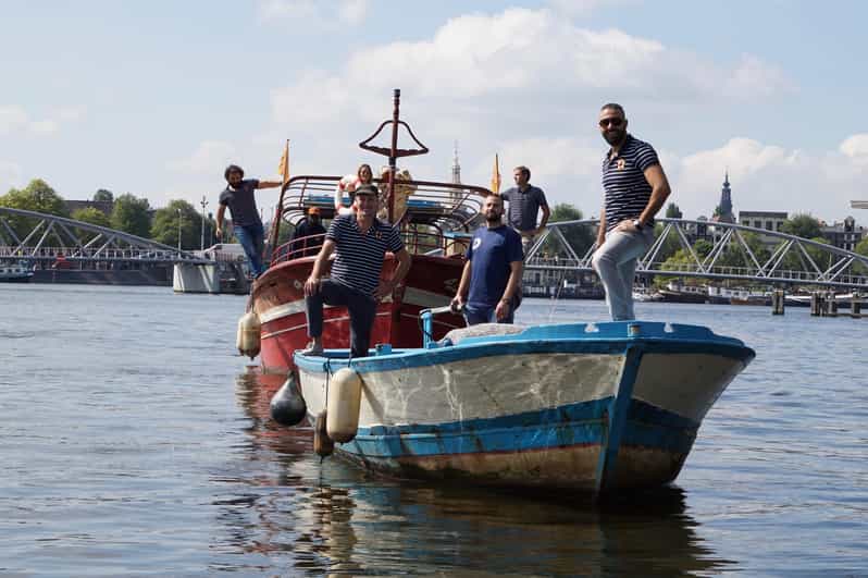 Amsterdam: Canal Cruise on a Wooden Refugee Boat - Key points to know before booking