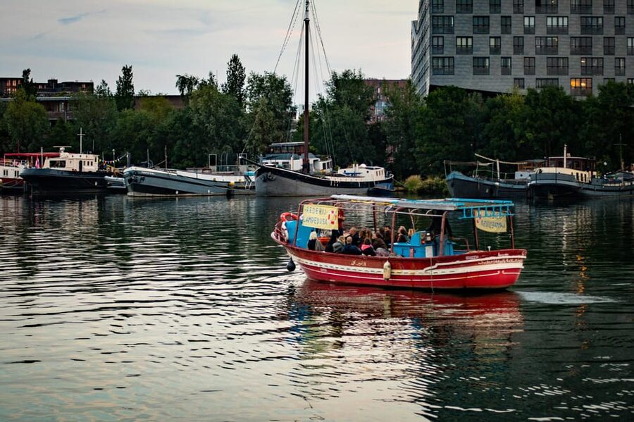 Amsterdam: Canal Cruise on a Wooden Refugee Boat - Amsterdam’s migration story beyond the postcard
