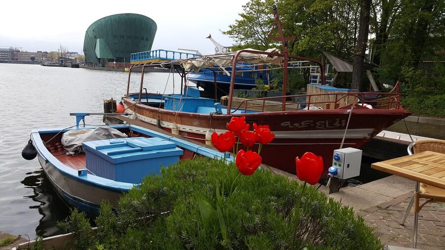 Amsterdam: Canal Cruise on a Wooden Refugee Boat - How this differs from a standard canal cruise