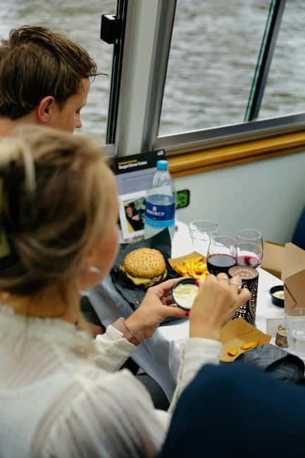 Amsterdam canal cruise with culinary burger or cheese & wine - Along the Nine Streets and Herengracht