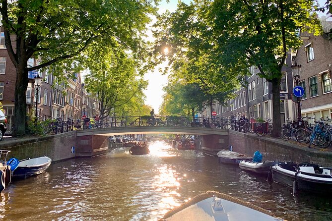 Amsterdam Canal Cruise with German Guide and unlimited drinks - The Hermitage area and a city in transition