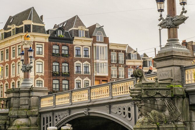 Amsterdam Canal Cruise with German Guide and unlimited drinks - Cointower and the final stretch
