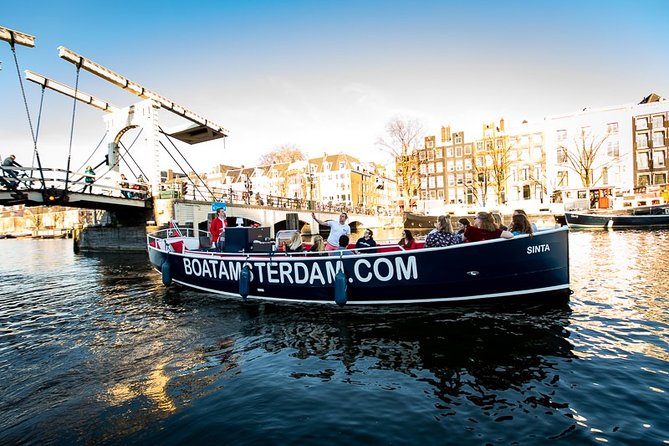 Amsterdam Canal Cruise With Live Guide and Unlimited Drinks - The Jordaan, Westerkerk, and Anne Frank House