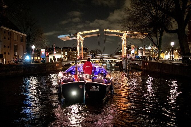 Amsterdam Canal Cruise With Live Guide and Unlimited Drinks - What the guide adds to the ride