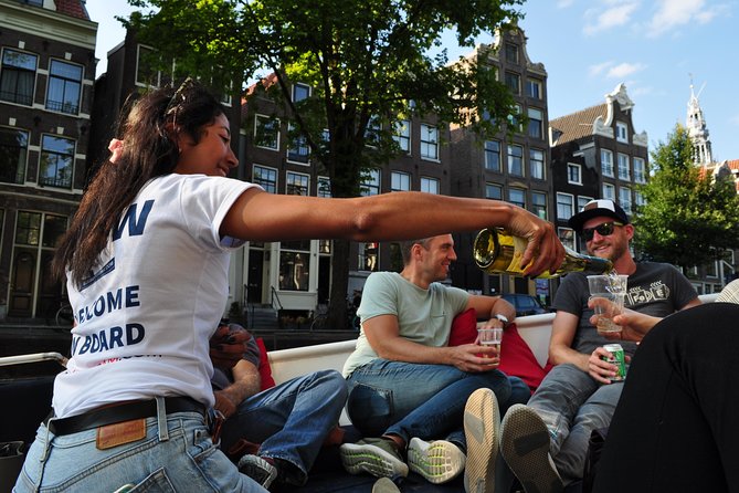 Amsterdam Canal Cruise With Live Guide and Unlimited Drinks - Magere Brug and the canal houses
