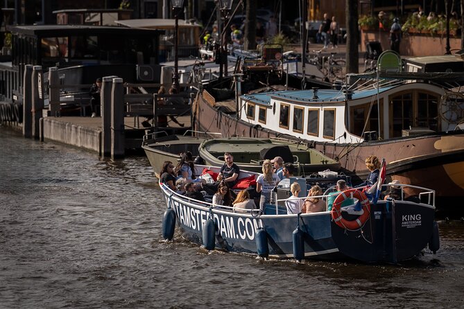 Amsterdam Canal Cruise with Live guide & Two drinks - Central St. - Small canals, old Church, and Central Station