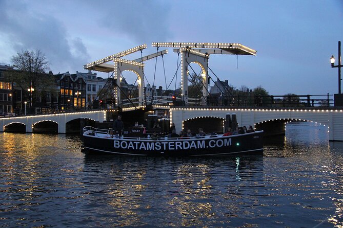 Amsterdam Canal Cruise with Open Bar - Central Station - Waterlooplein, Montelbaanstoren, and Rembrandt