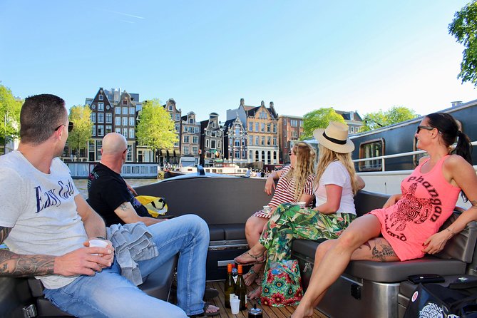 Amsterdam Canal Tour by Open Boat – 90 min Small Group Experience - From the Amstel to Amsterdam’s leaning houses