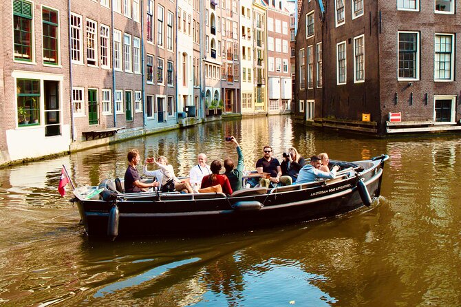 Amsterdam Canal Tour by Open Boat – 90 min Small Group Experience - From the VOC ship to the green eastern canals