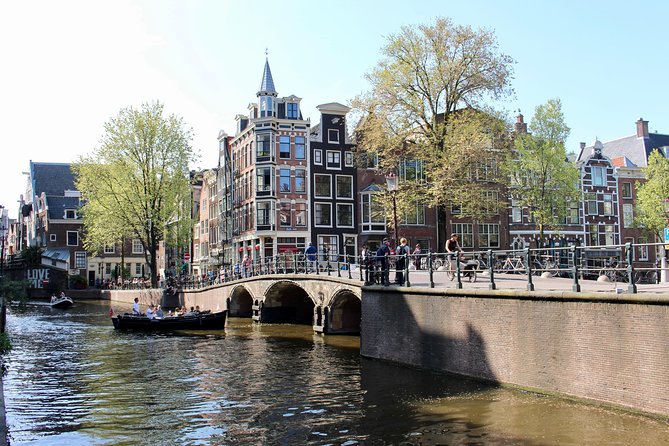 Amsterdam Canal Tour by Open Boat – 90 min Small Group Experience - Herengracht and the Seven Bridges