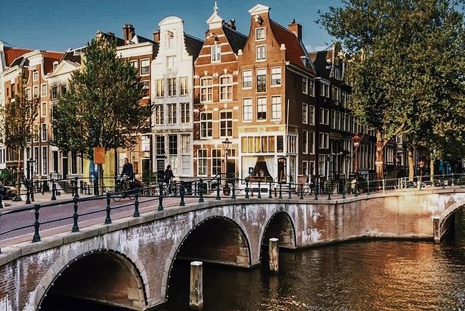 Amsterdam City Center & History - Exclusive Guided Walking Tour - Starting at St. Nicholas Basilica and the medieval harbor
