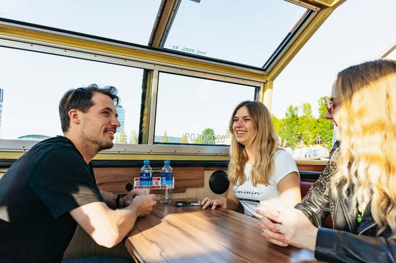 Amsterdam: City Centre Canal Cruise & Free Flower Cocktail - Why the covered boat matters