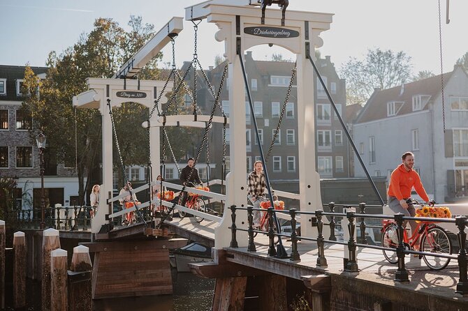 Amsterdam City Top Highlights Guided Bike Tour - What the guides add to the ride