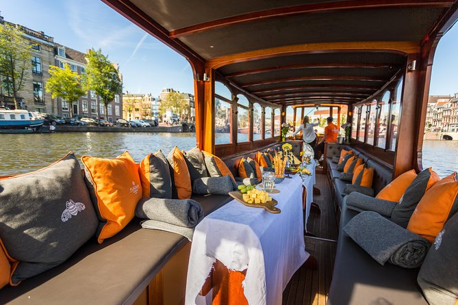 Amsterdam Classic Saloon Boat Cruise with Drinks and Cheese - A relaxed hour on Amsterdam’s canals