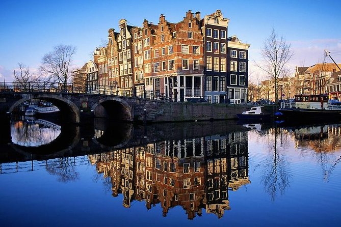 Amsterdam: E-Bike Sightseeing Tour - Amsterdam Centraal and the ride back