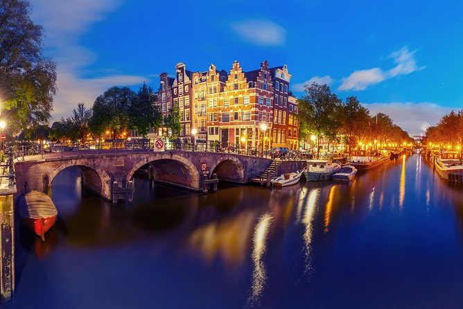 Amsterdam Evening Canal Cruise with Live Guide and Onboard Bar - The Rijksmuseum, Amstel, and Magere Brug