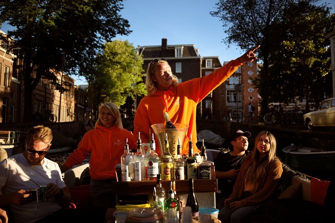 Amsterdam Evening Canal Cruise with Live Guide and Onboard Bar - Canal curves, the Munttoren, and the Venice of the North