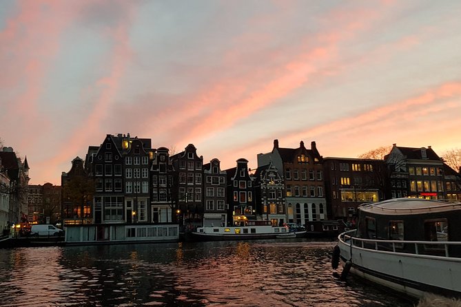 Amsterdam Evening Cosy & Small Cruise & Drinks and Bites - Sunset - Sunset views, houseboats, and lit canal houses