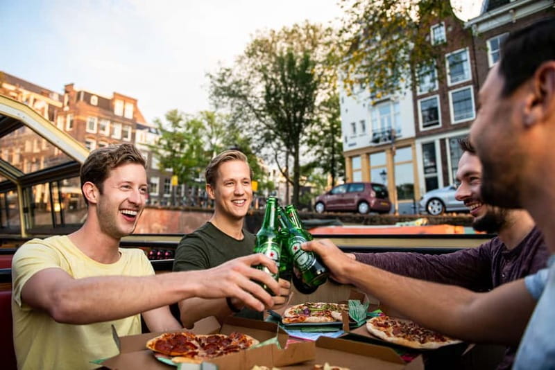 Amsterdam: Evening Pizza Cruise Along the Canals - Choosing your pizza before the boat reaches the sights