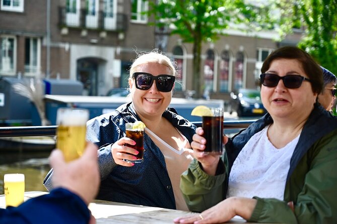 Amsterdam Food Tour of 10+ Local Classic Tastings in Jordaan Area - The fishmonger stop brings herring and kibbeling