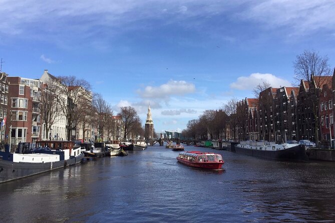 Amsterdam full day tour: Walking, Biking and Cruising - Seeing the canals from the water