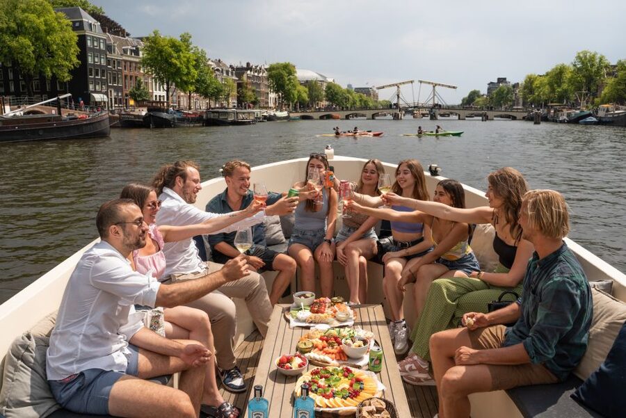 Amsterdam: German Guided Canal Cruise with on Board Bar - Key points about this Amsterdam canal cruise