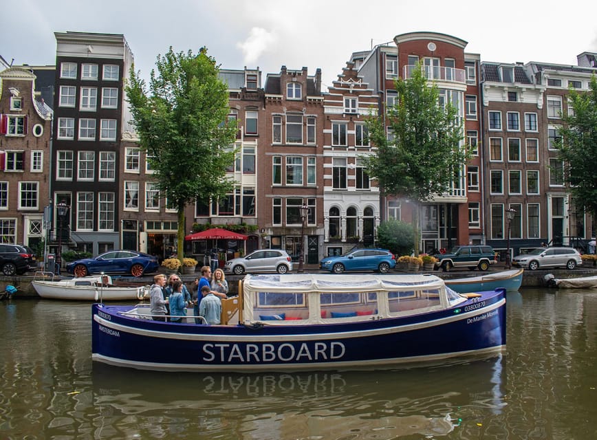 Amsterdam: German Guided Canal Cruise with on Board Bar - Oude Kerk and the city’s oldest buildings