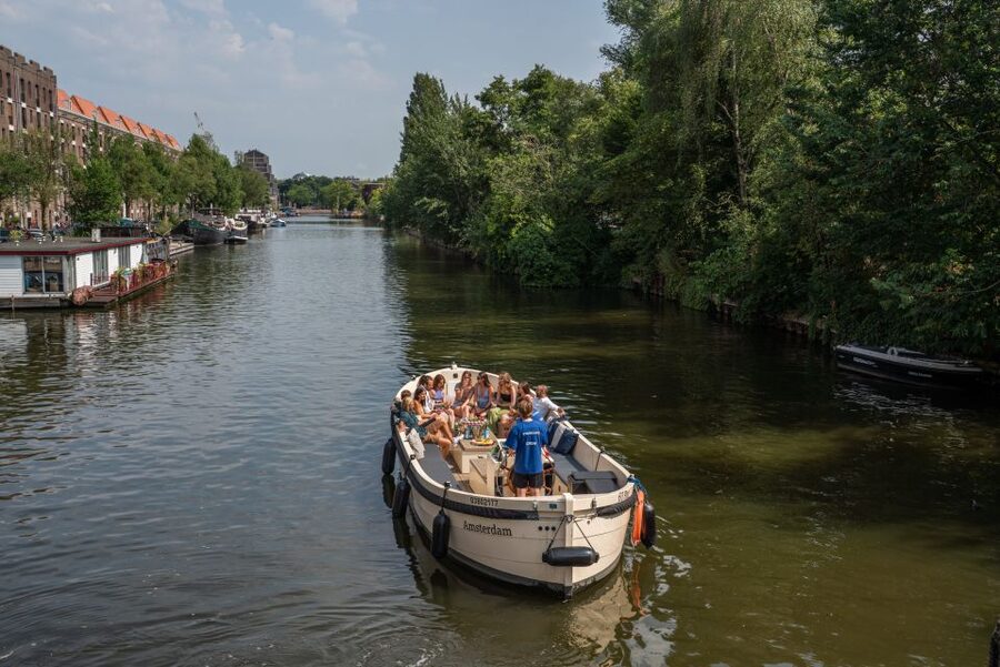 Amsterdam: German Guided Canal Cruise with on Board Bar - Basilica of Saint Nicholas and the Maritime Museum