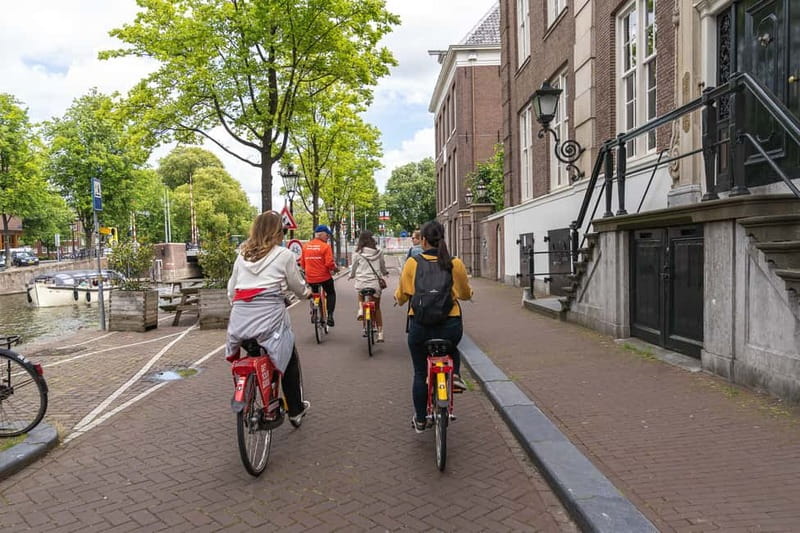 Amsterdam: Guided Bike Tour City Centre in EN/DE/FR/ES - Starting near Central Station and the Western Islands