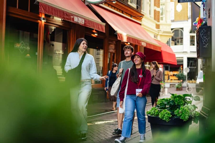 Amsterdam: Guided Cultural Food Tour in German or English - Damrak Avenue and Beurs van Berlage
