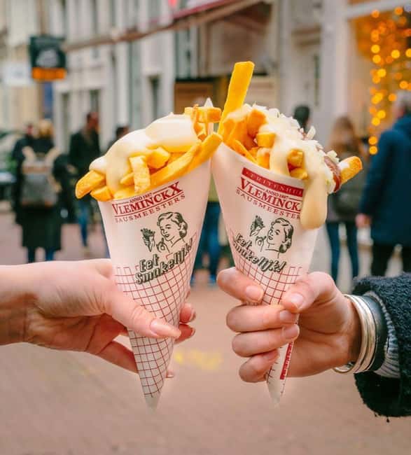 Amsterdam: Guided Cultural Food Tour in German or English - A manageable walk, but wear proper shoes