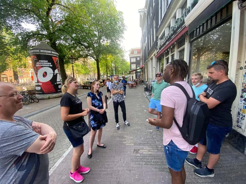 Amsterdam: Guided Ganja Walking Tour of Coffee Shops - Dutch bar, snacks, and the social side