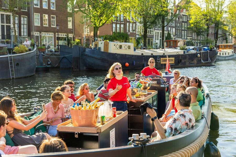 Amsterdam: Guided Open Boat Canal Cruise Including Drink - Commentary, atmosphere, and the open-bar choice